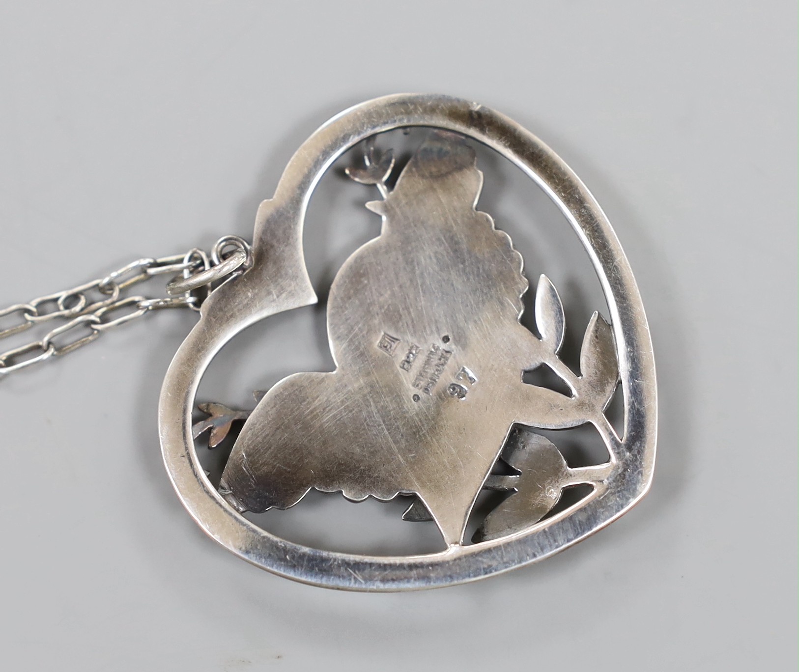 A Georg Jensen sterling 'Robin and frond' heart shaped pendant necklace, no. 97, 36mm.